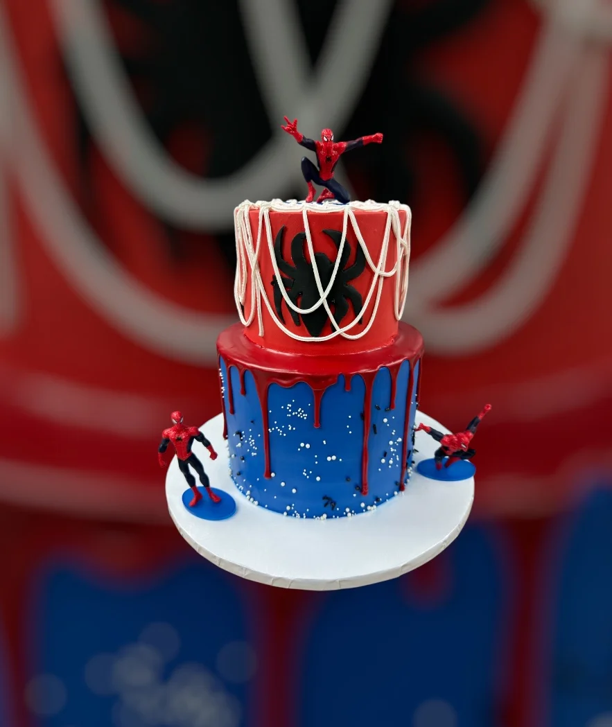Spider-Man themed birthday cake with vibrant colors and decorations