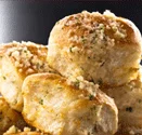 Flaky Southern-style biscuits topped with garlic butter