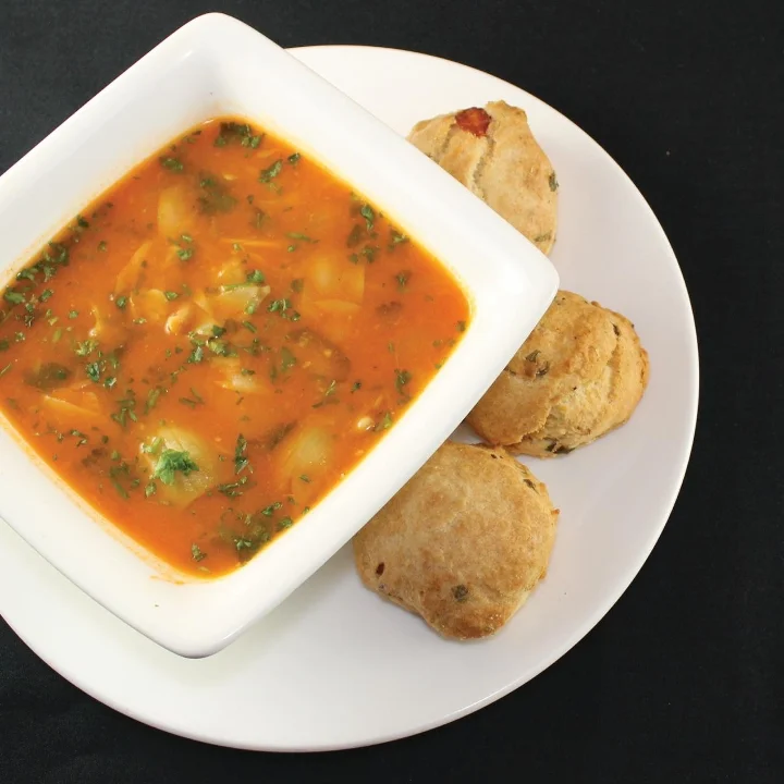 Bowl of house-made Chicken Tuscan Soup served at Post Oak Grill Downtown Houston.