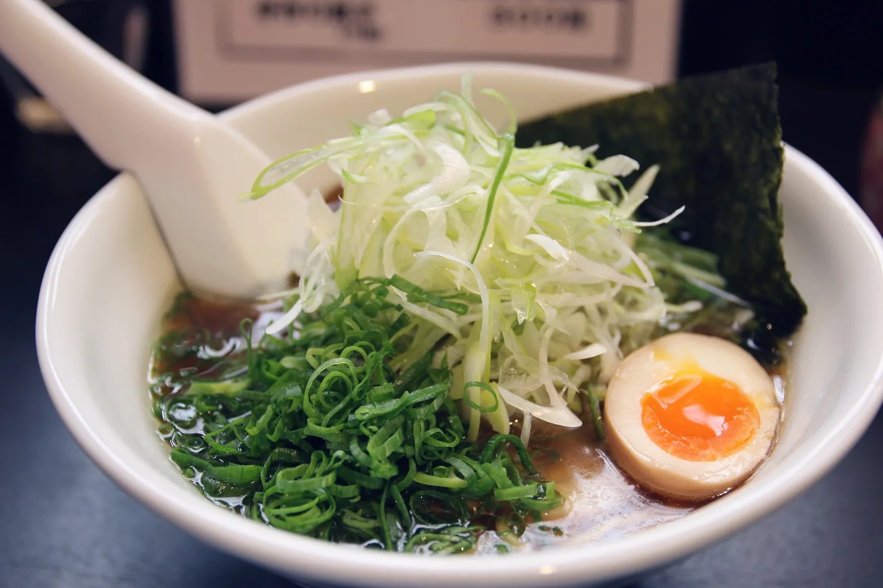 Japanese shoyu ramen with green onions and soft-boiled egg