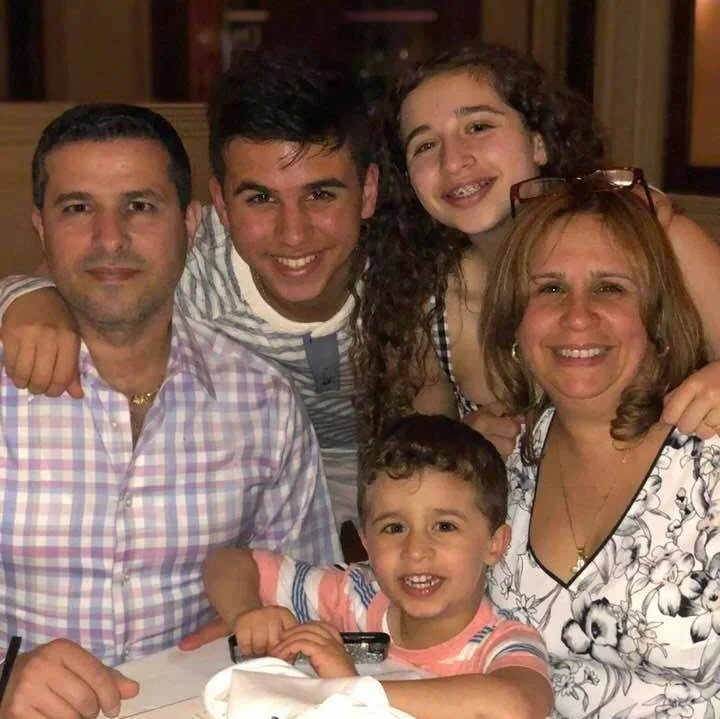 Family enjoying a meal together at a restaurant