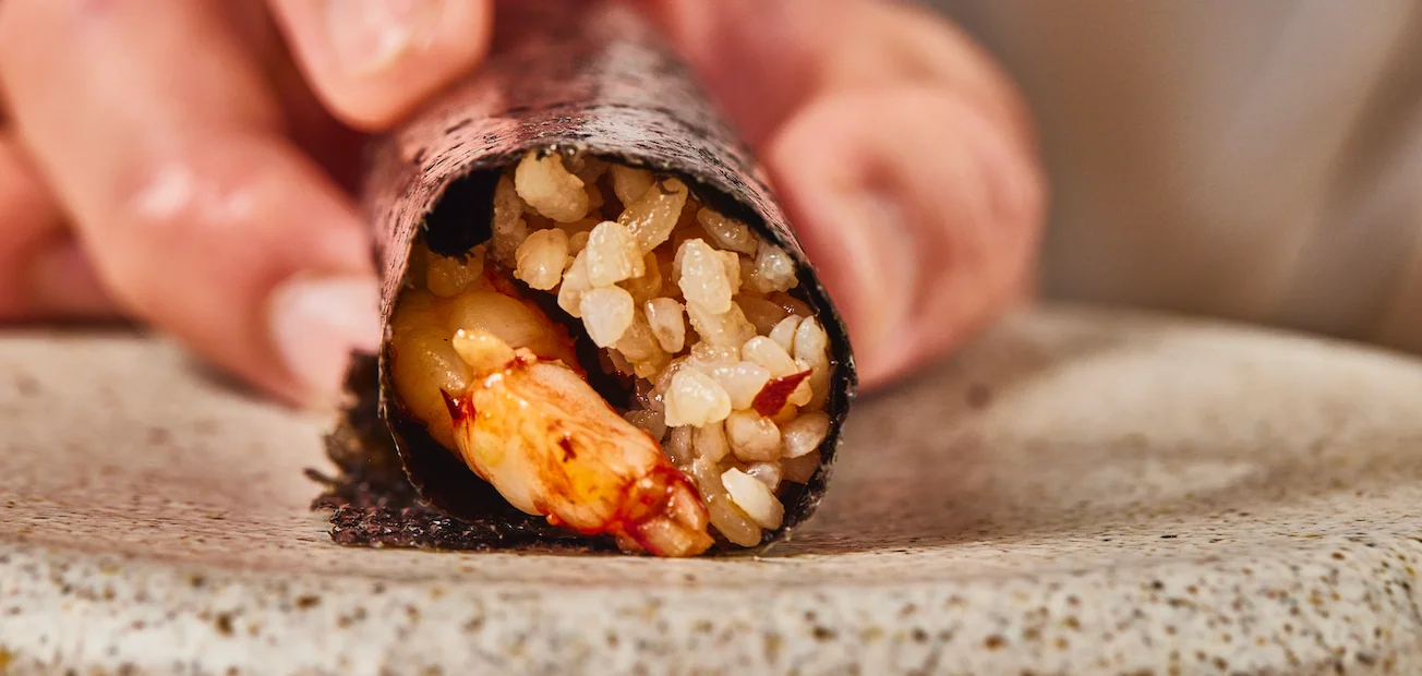 Japanese sushi hand roll with shrimp and rice
