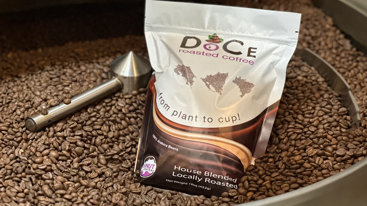 Bag of roasted coffee beans from DoCe, showcasing local blends