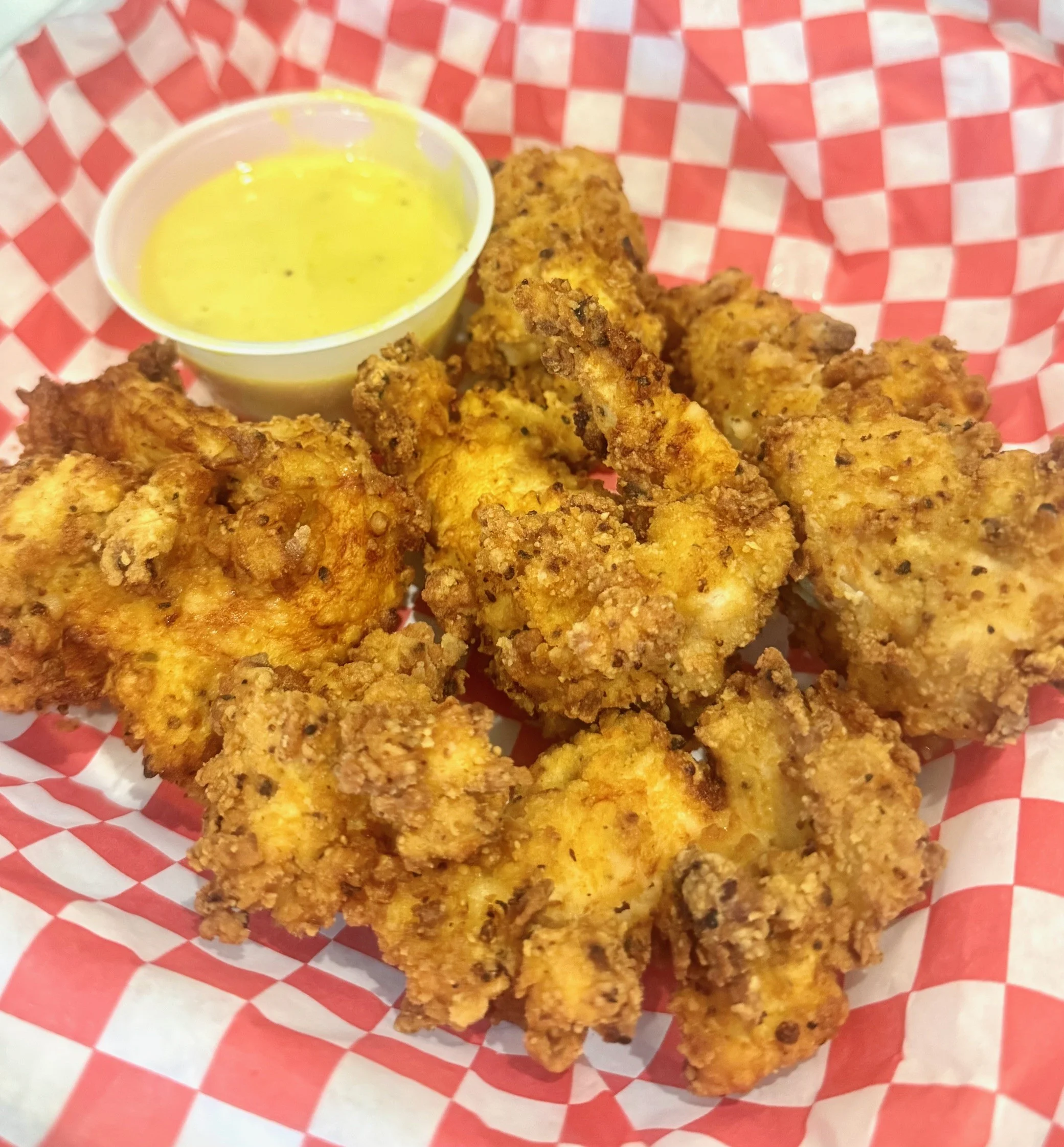 Crispy Southern-style hush puppies with dipping sauce