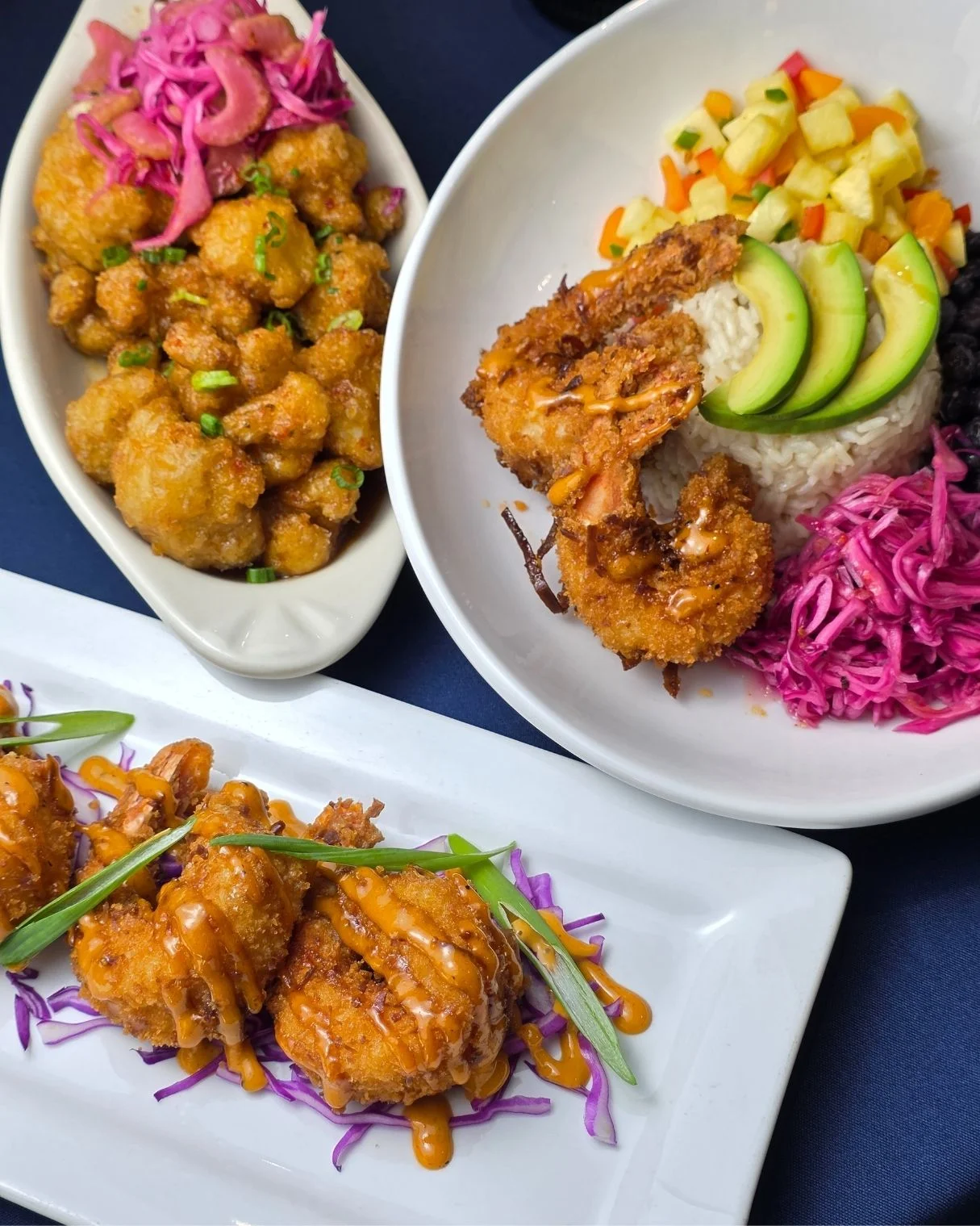 Crispy shrimp platter with tropical sides