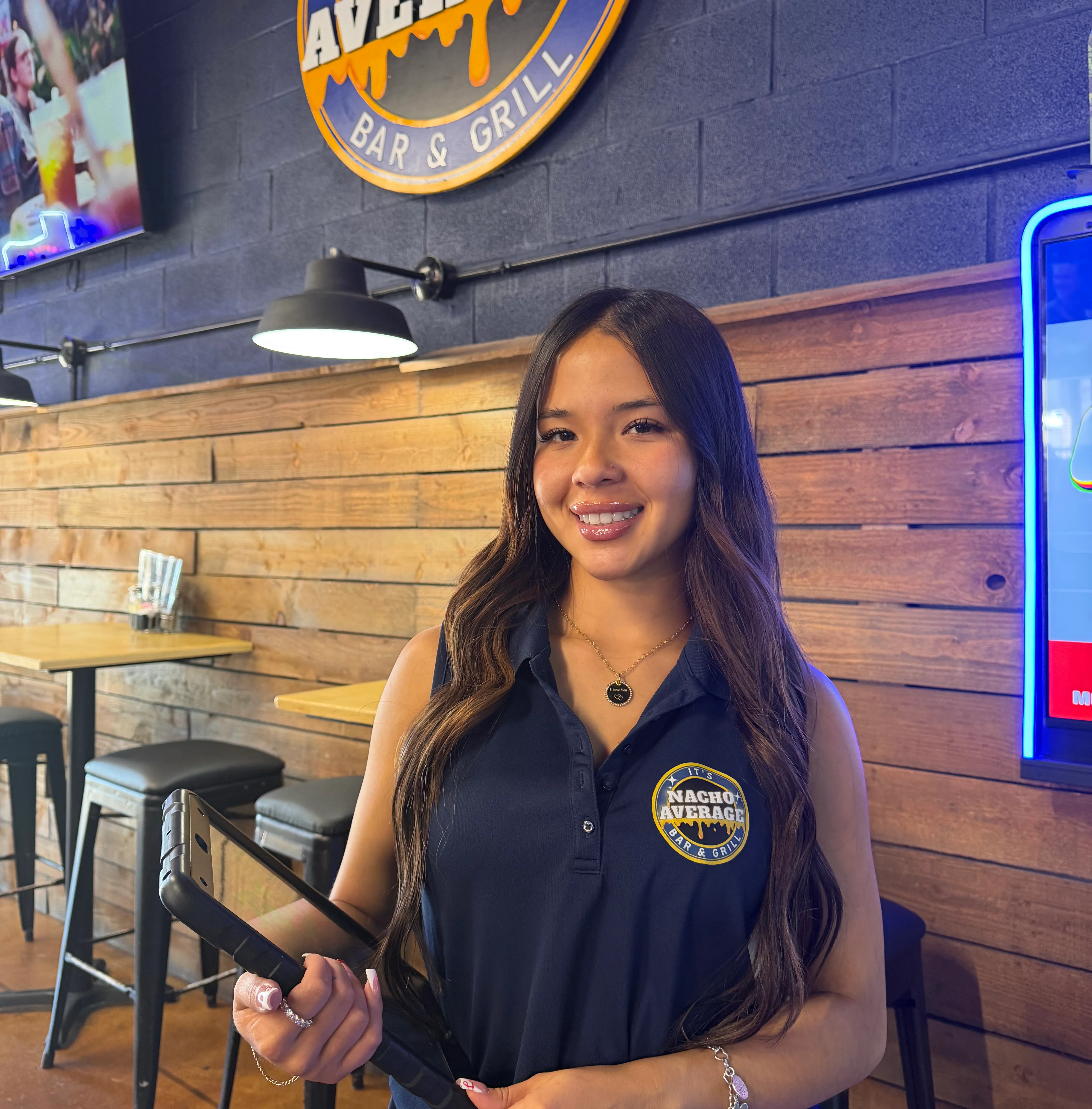 Friendly staff member at Nacho Average Bar & Grill