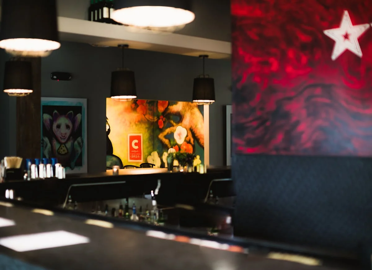 Stylish restaurant interior with modern art and bar counter