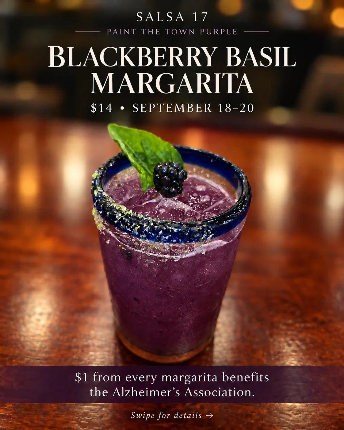 Vibrant blackberry basil margarita in a decorative glass