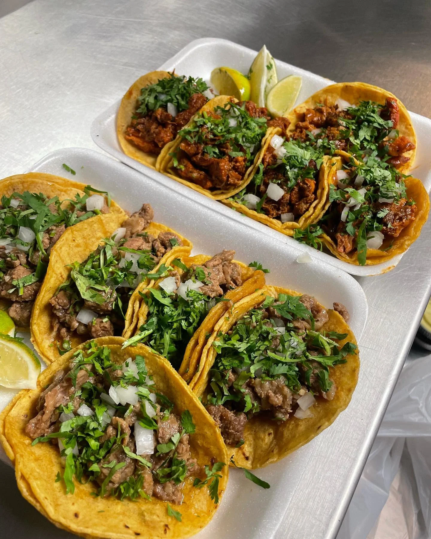 Authentic Mexican street tacos with cilantro, onion, and lime