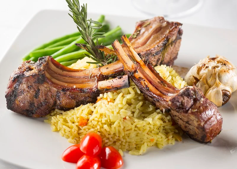 A restaurant chef preparing a dish