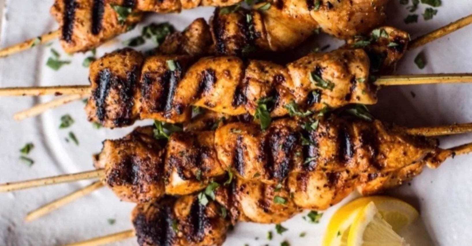 Grilled chicken skewers with herbs, a popular Middle Eastern dish