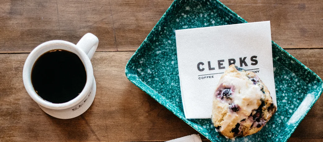 Freshly baked blueberry scone with coffee