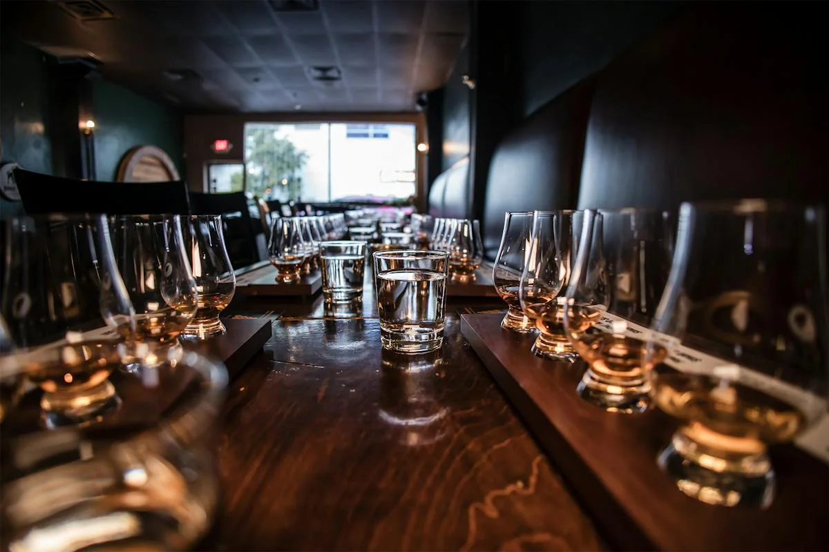 Elegant restaurant dining table set with wine glasses and water glasses