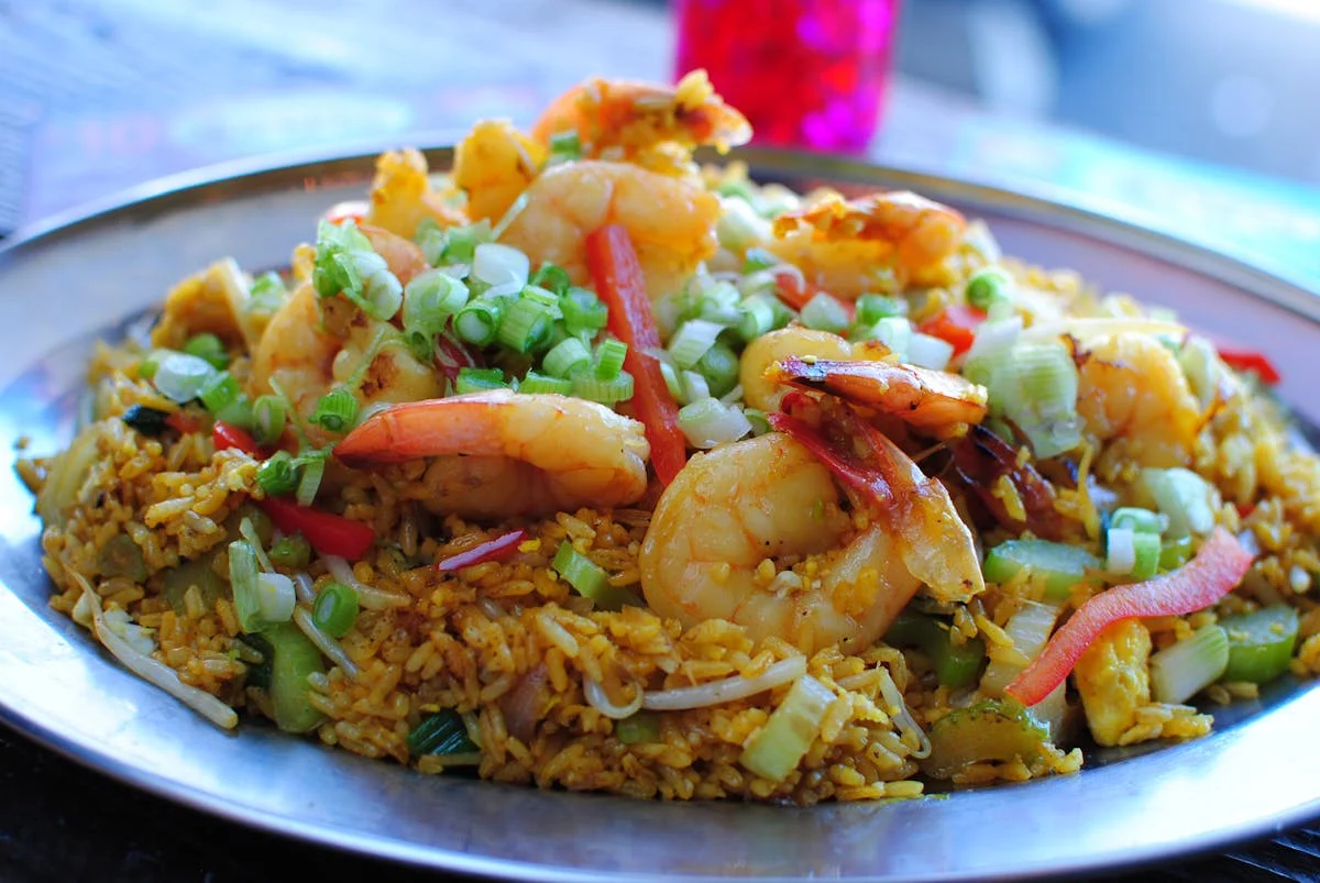 Shrimp fried rice garnished with green onions
