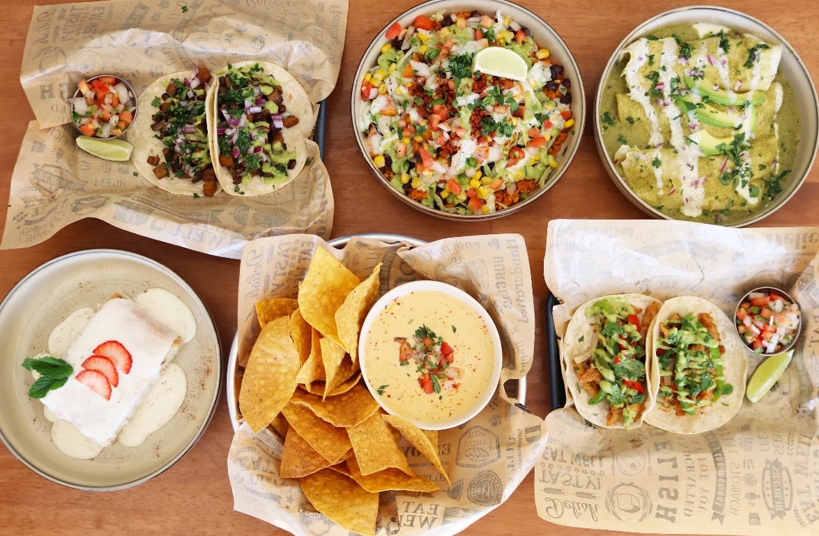 Colorful Mexican taco platter with nachos and enchiladas