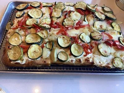 Vegetable focaccia with zucchini and bell peppers