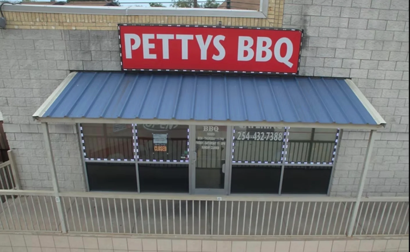 Exterior view of Petty's BBQ restaurant with signage