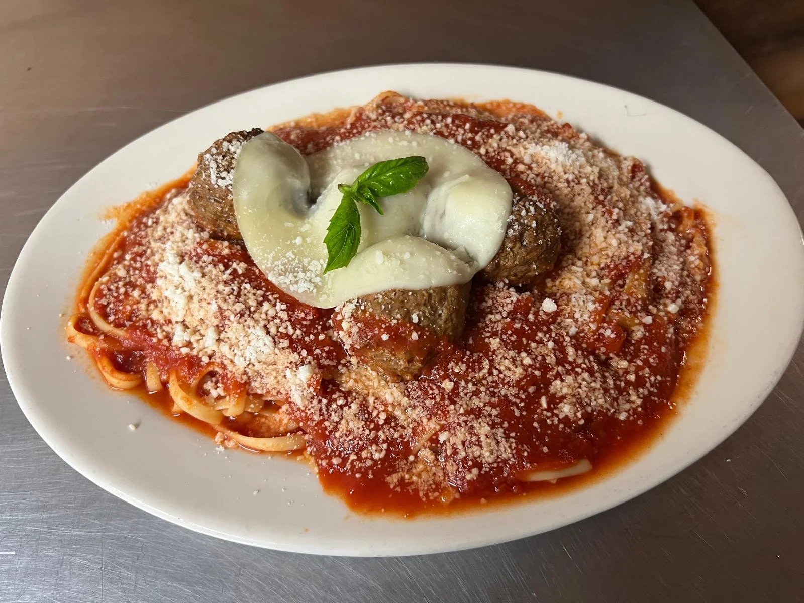 Classic Italian spaghetti and meatballs with marinara sauce