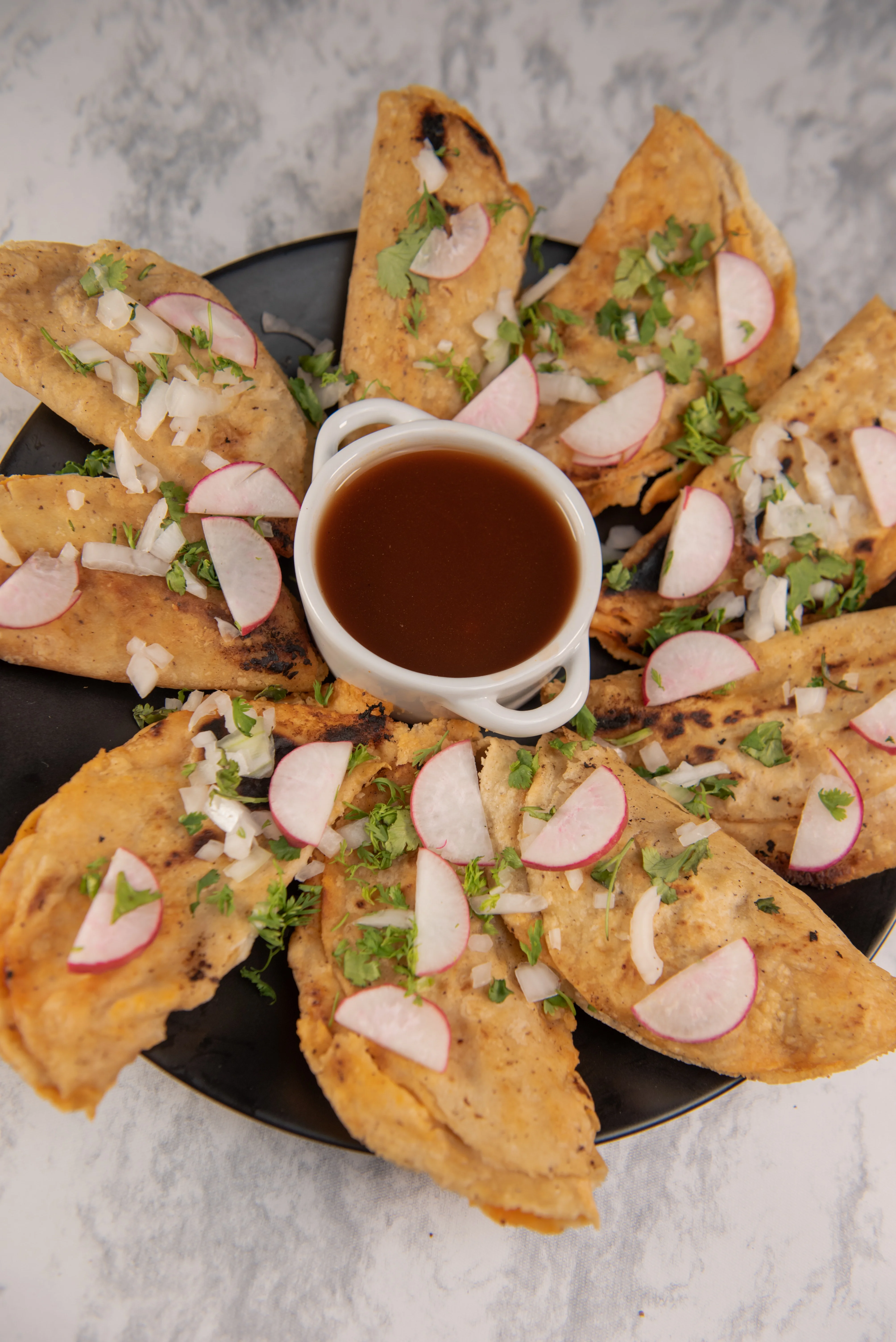 Delicious Mexican quesadillas served with salsa