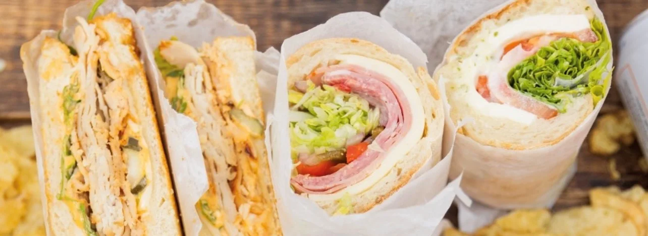 Delicious deli sandwiches with assorted meats and fresh vegetables