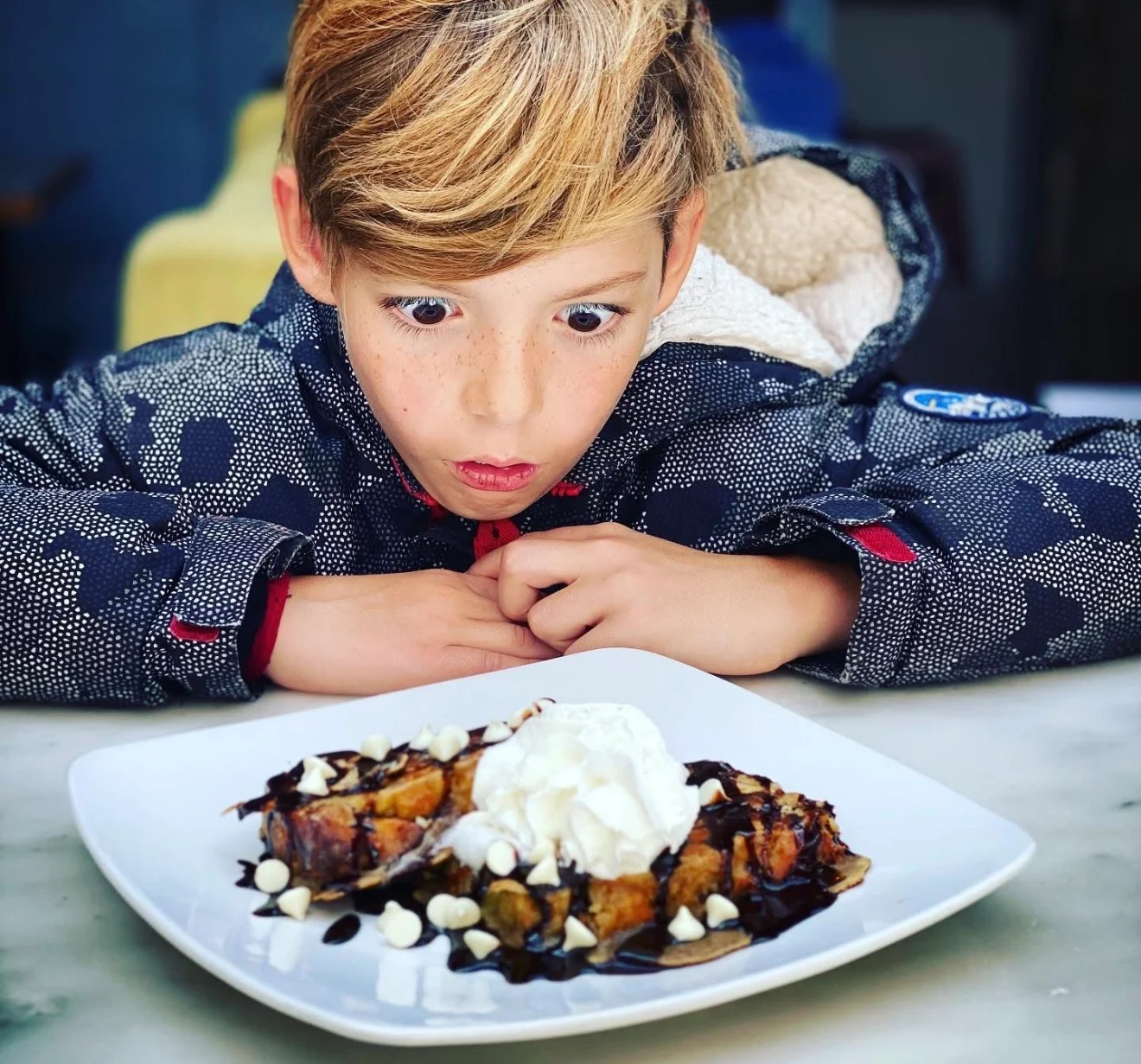A child excited and amazed for his breakfast