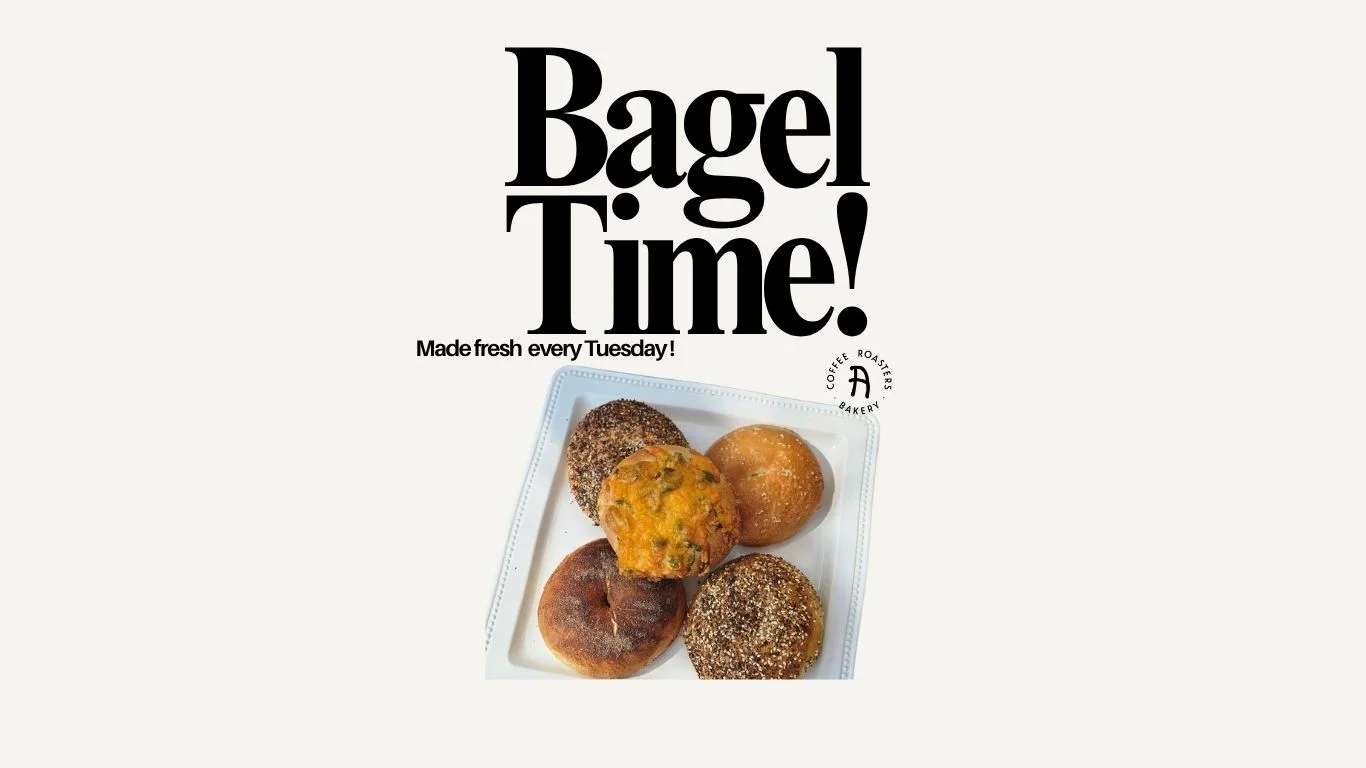 Freshly baked bagels on a serving tray