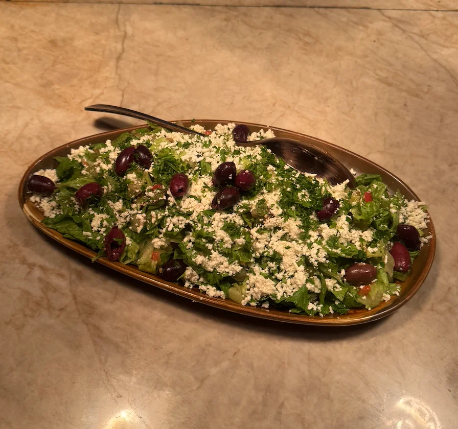 A bowl of Greek salad from Sufrat Grill