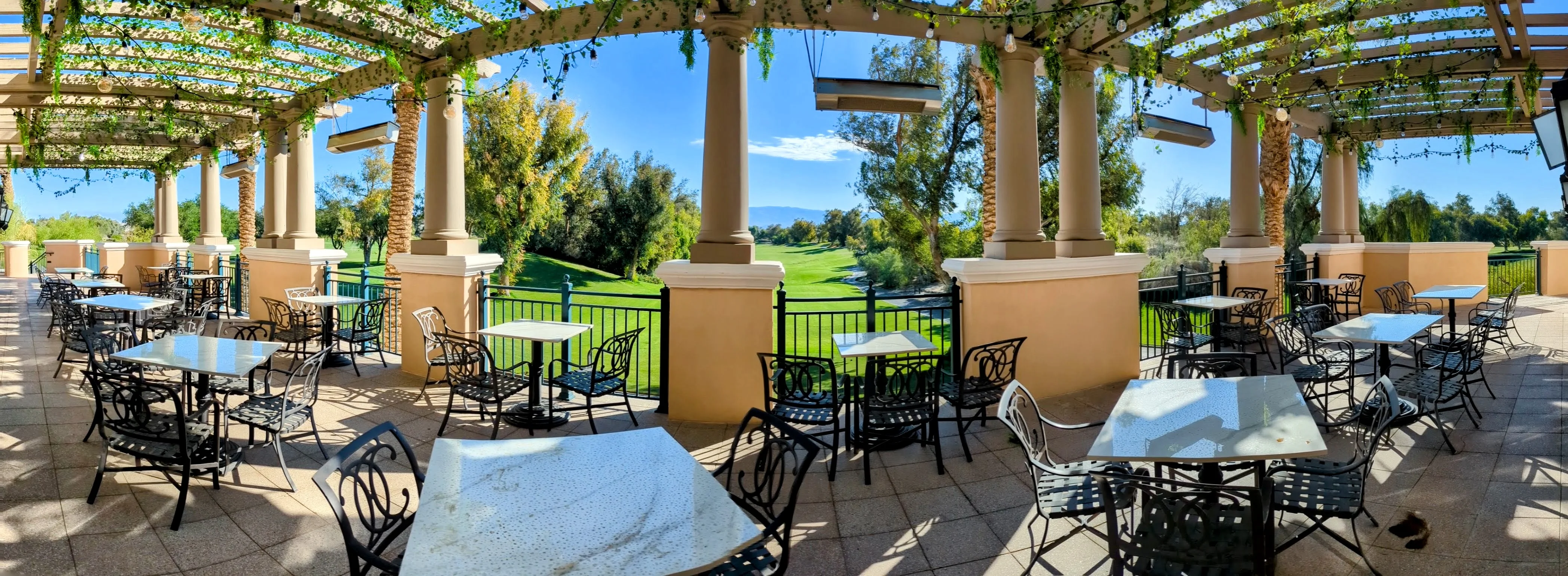 Outdoor dining area with scenic views and elegant decor