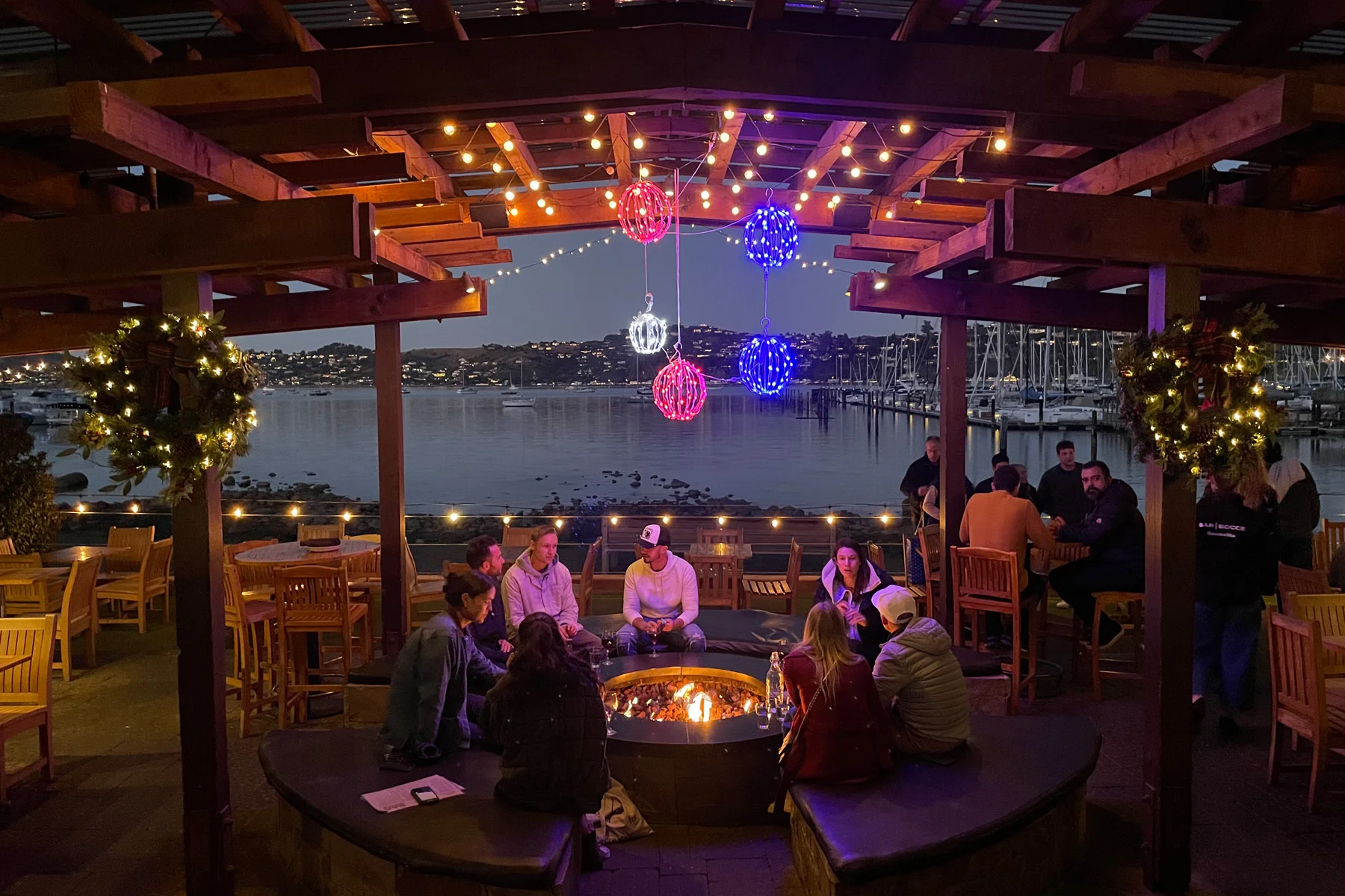 Bar Bocce firepit with holiday lights