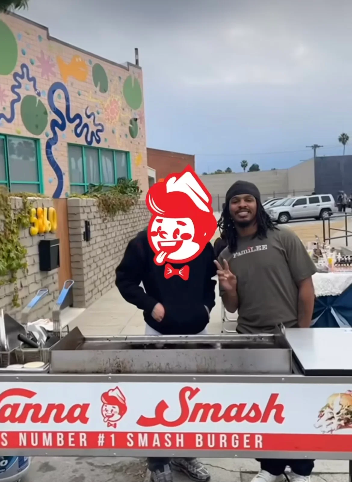 Smash burger food stall with chefs smiling