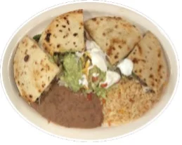 Delicious Mexican quesadilla platter with guacamole and beans