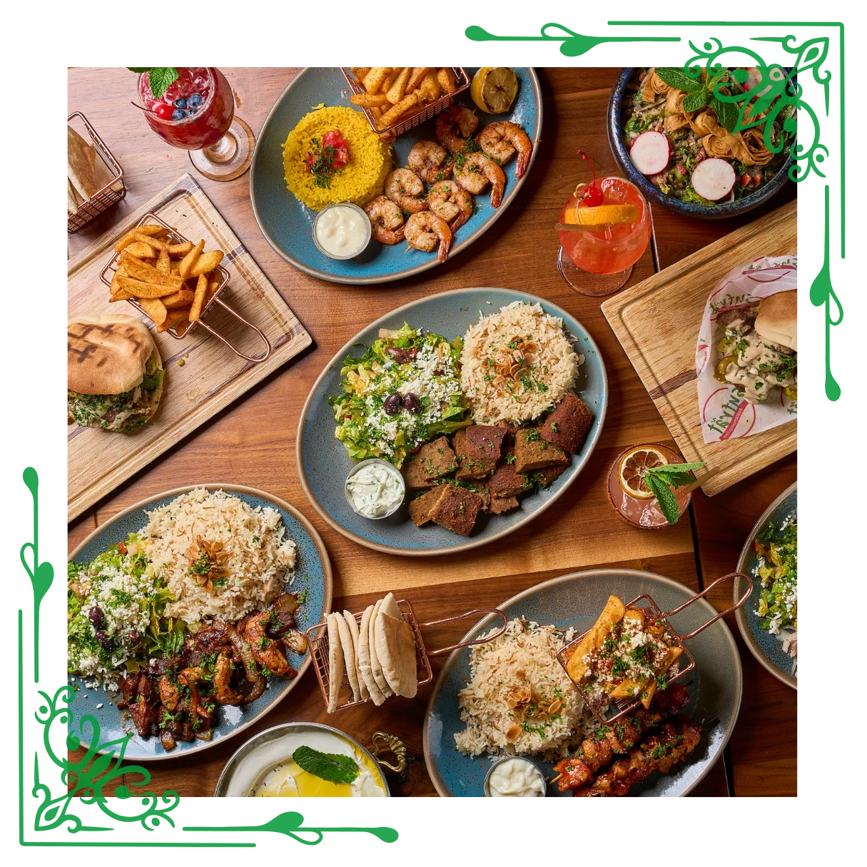 A table filled with diverse Middle Eastern dishes. Plates feature rice, grilled meats, and vibrant salads. Drinks and pita bread complete the colorful, festive setup.
