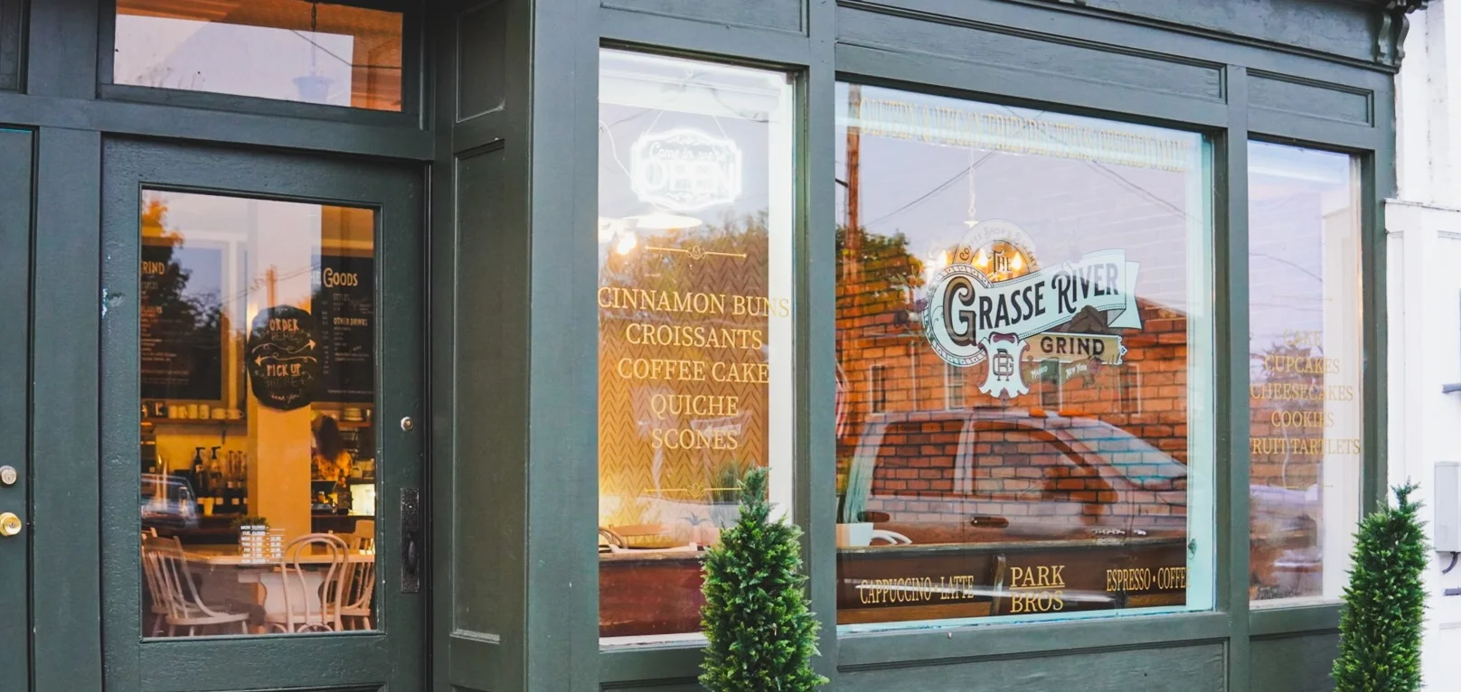 Charming café exterior with baked goods signage