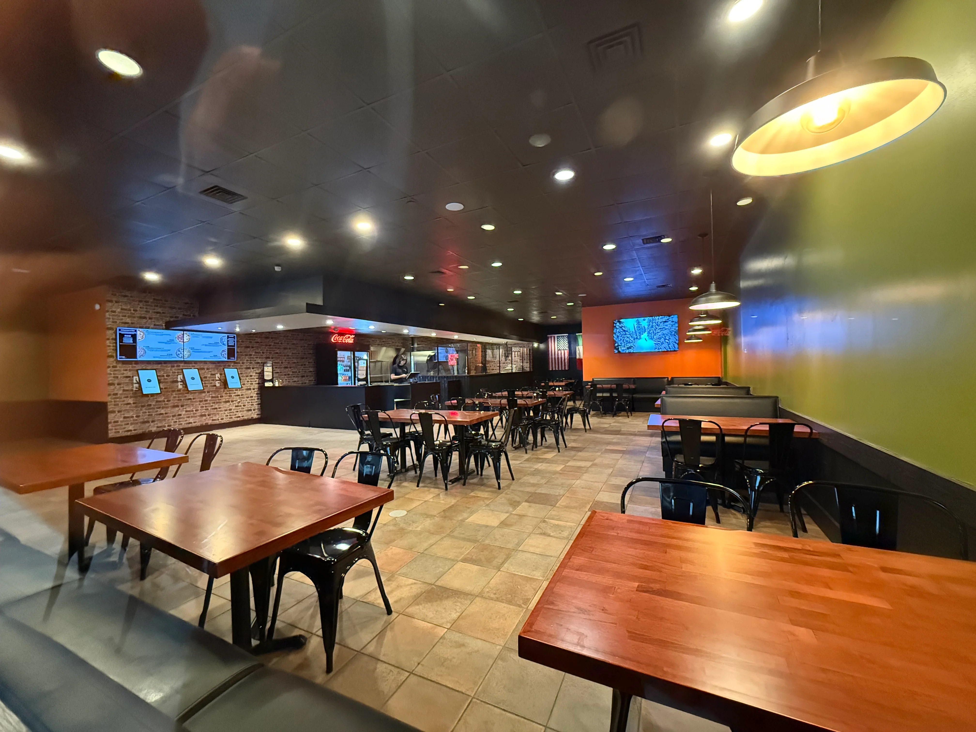Cozy restaurant interior with modern decor and warm lighting