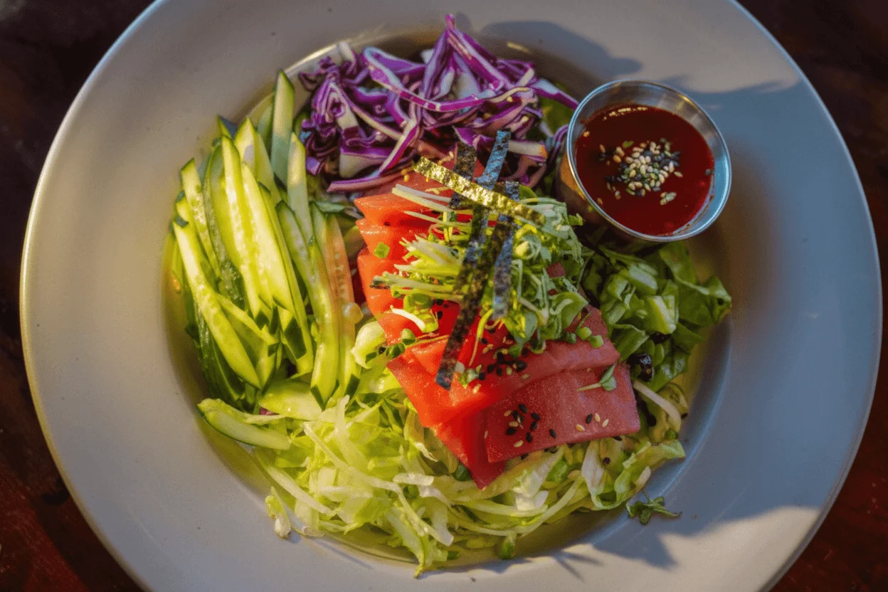 Colorful Korean salad with fresh vegetables and spicy sauce