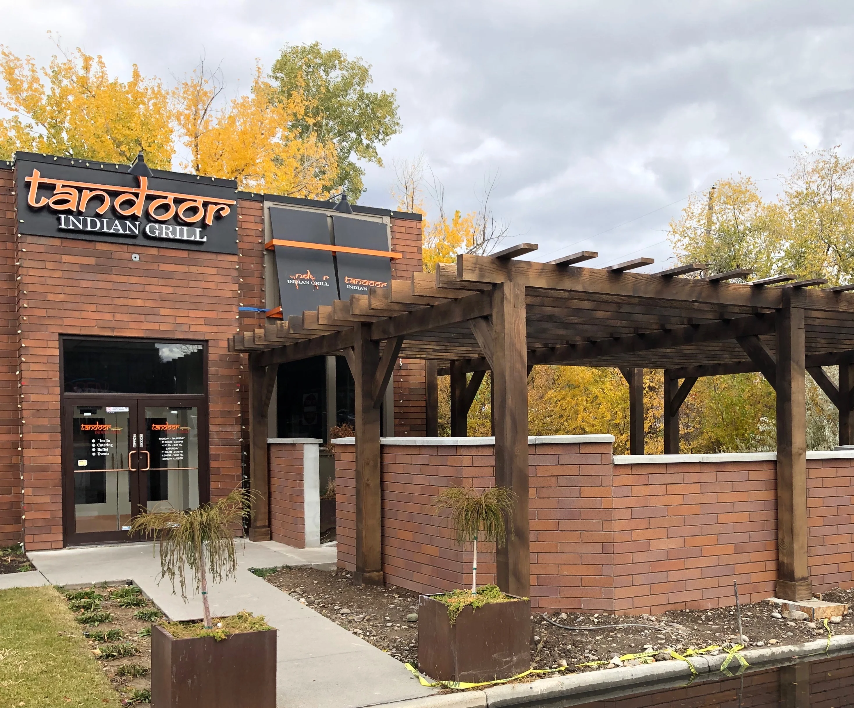 Exterior view of Tandoor Indian Grill restaurant with modern architecture