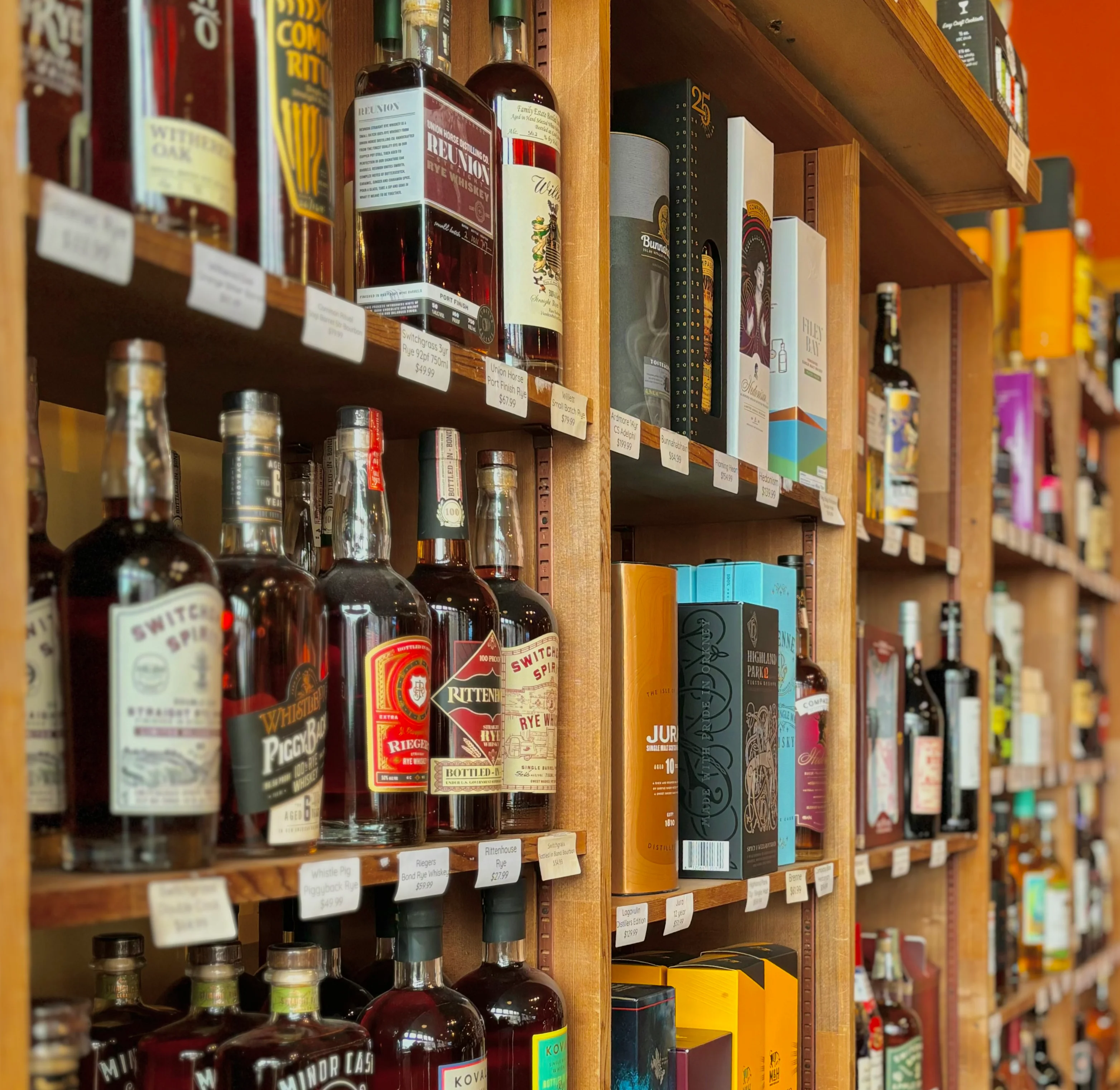 Our wall of spirits, featuring a wide variety of liquors, many of them from local producers!