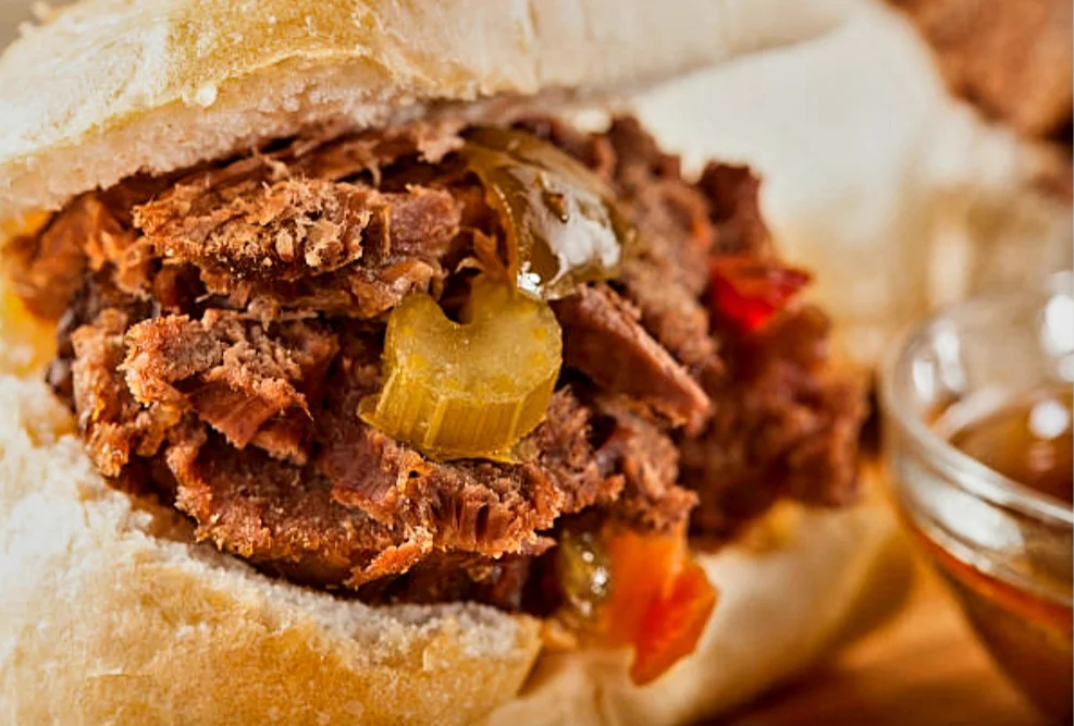 Italian beef sandwich with peppers on a crusty roll