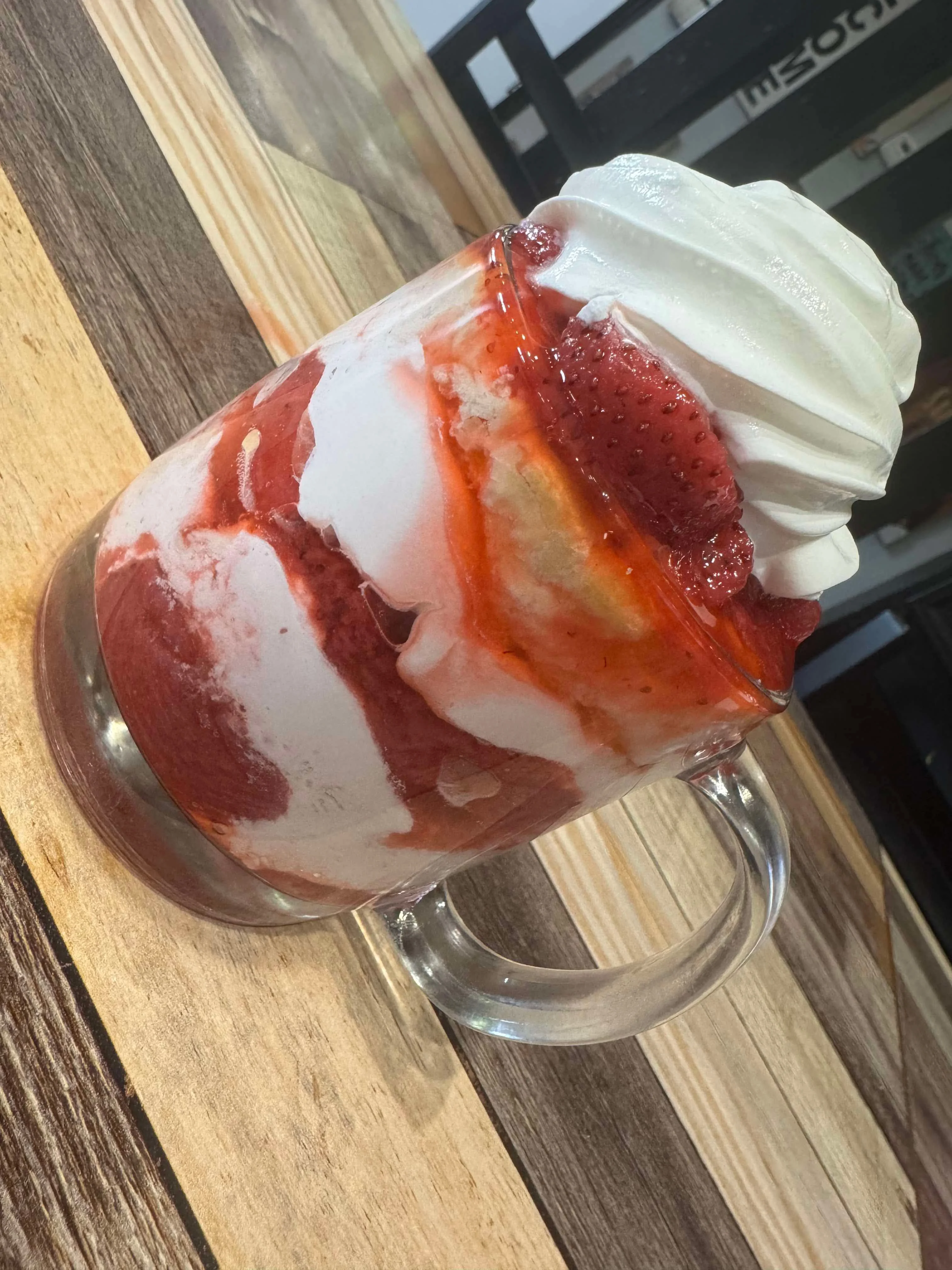 Delicious strawberry shortcake parfait in a glass mug