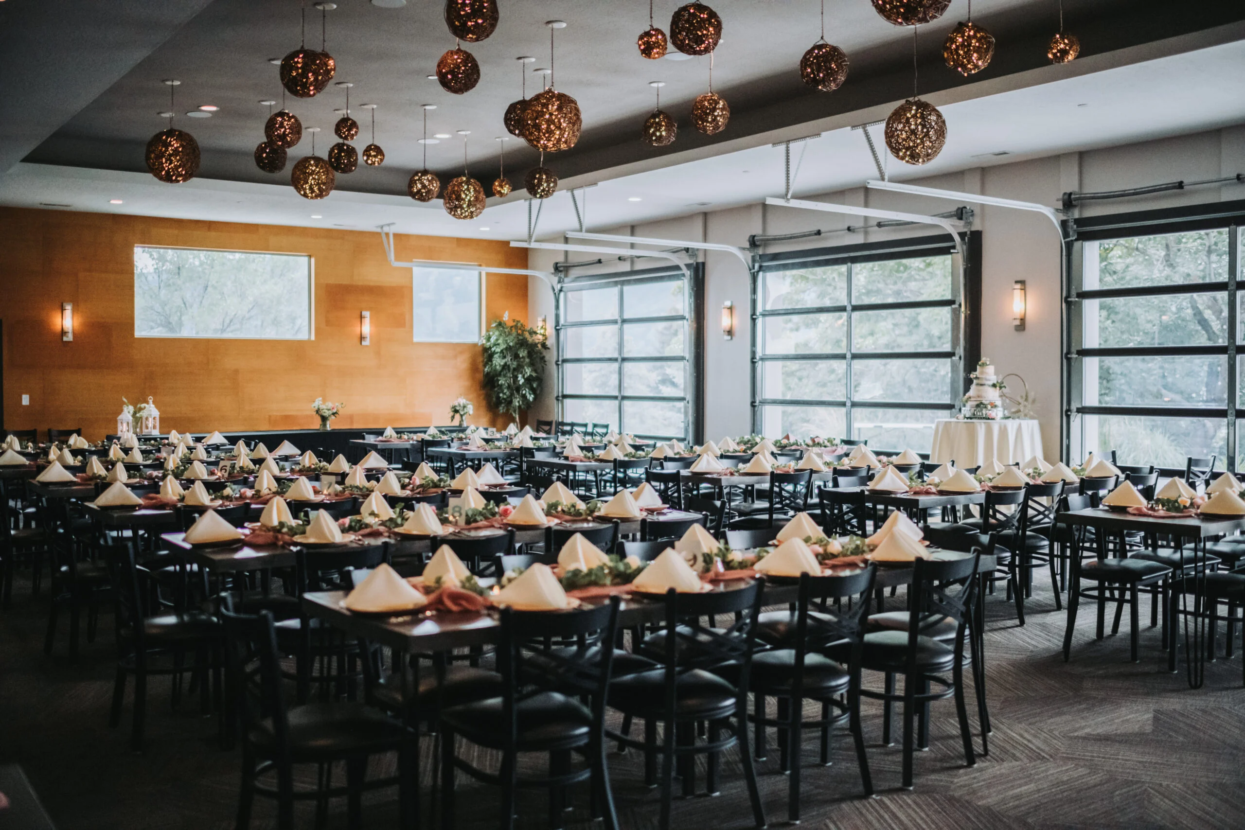 Elegant dining setup in a modern restaurant with decorative lighting