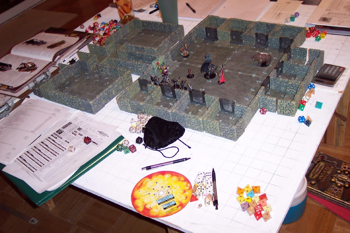 Tabletop RPG setup with miniatures and dice