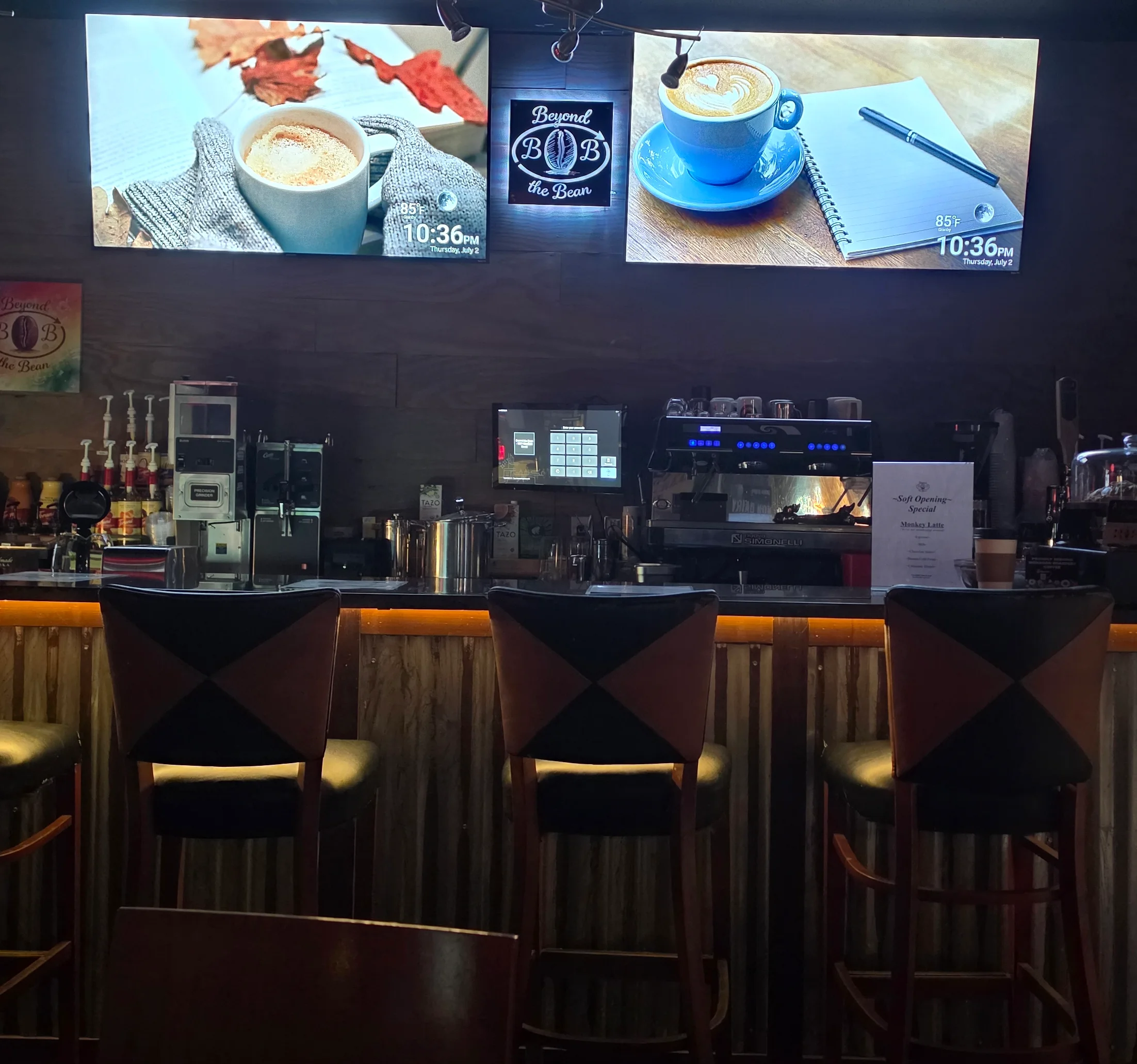 Cozy coffee bar interior with modern decor and warm lighting