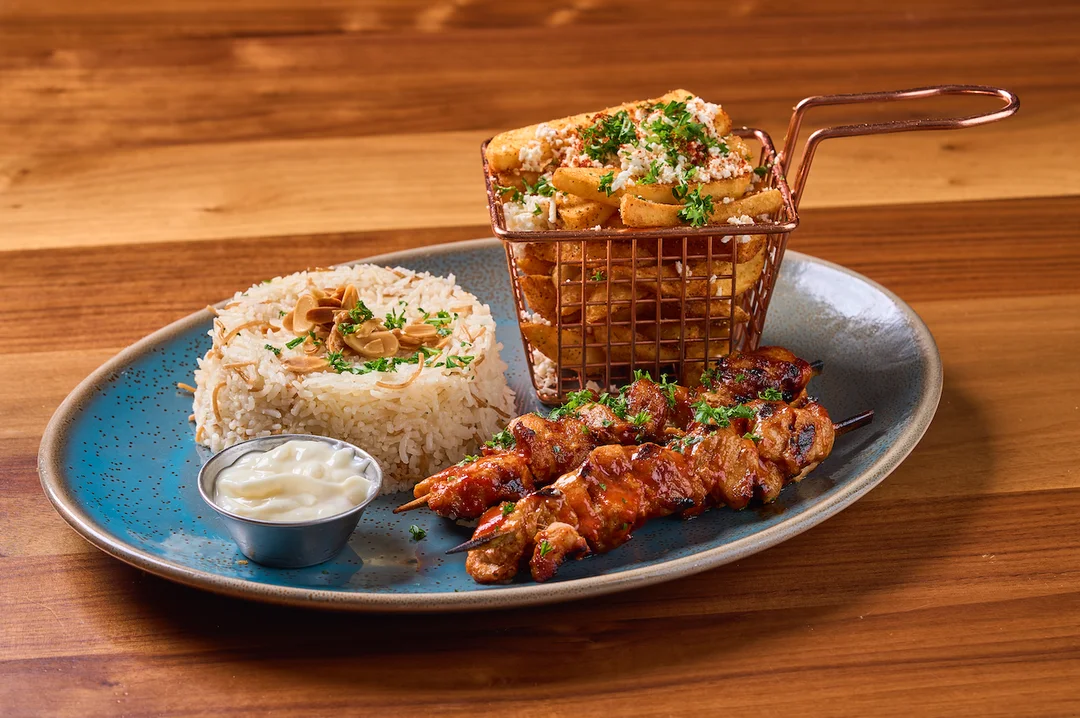 Tandoori chicken platter from Sufrat Grill menu. 