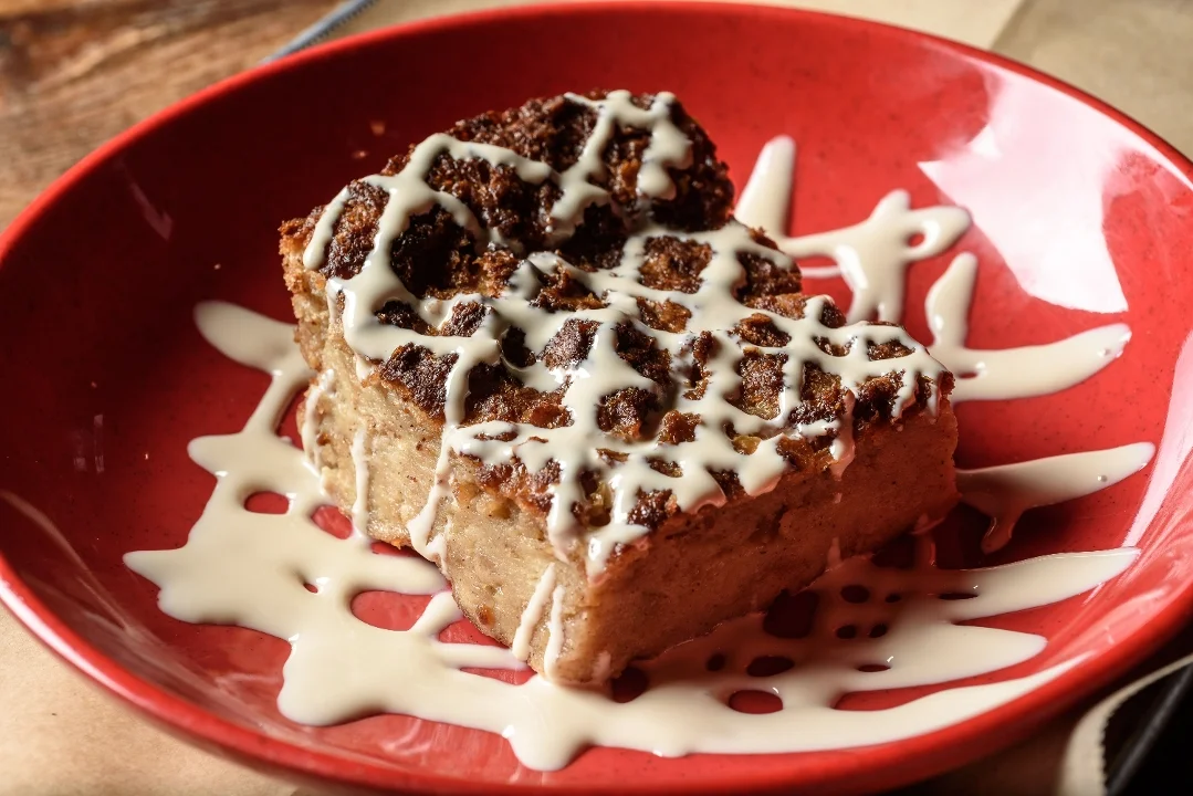 White chocolate bread pudding drizzled with icing at VooDoo BBQ in Pensacola.