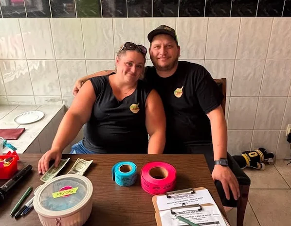 Friendly restaurant staff at a cozy dining table