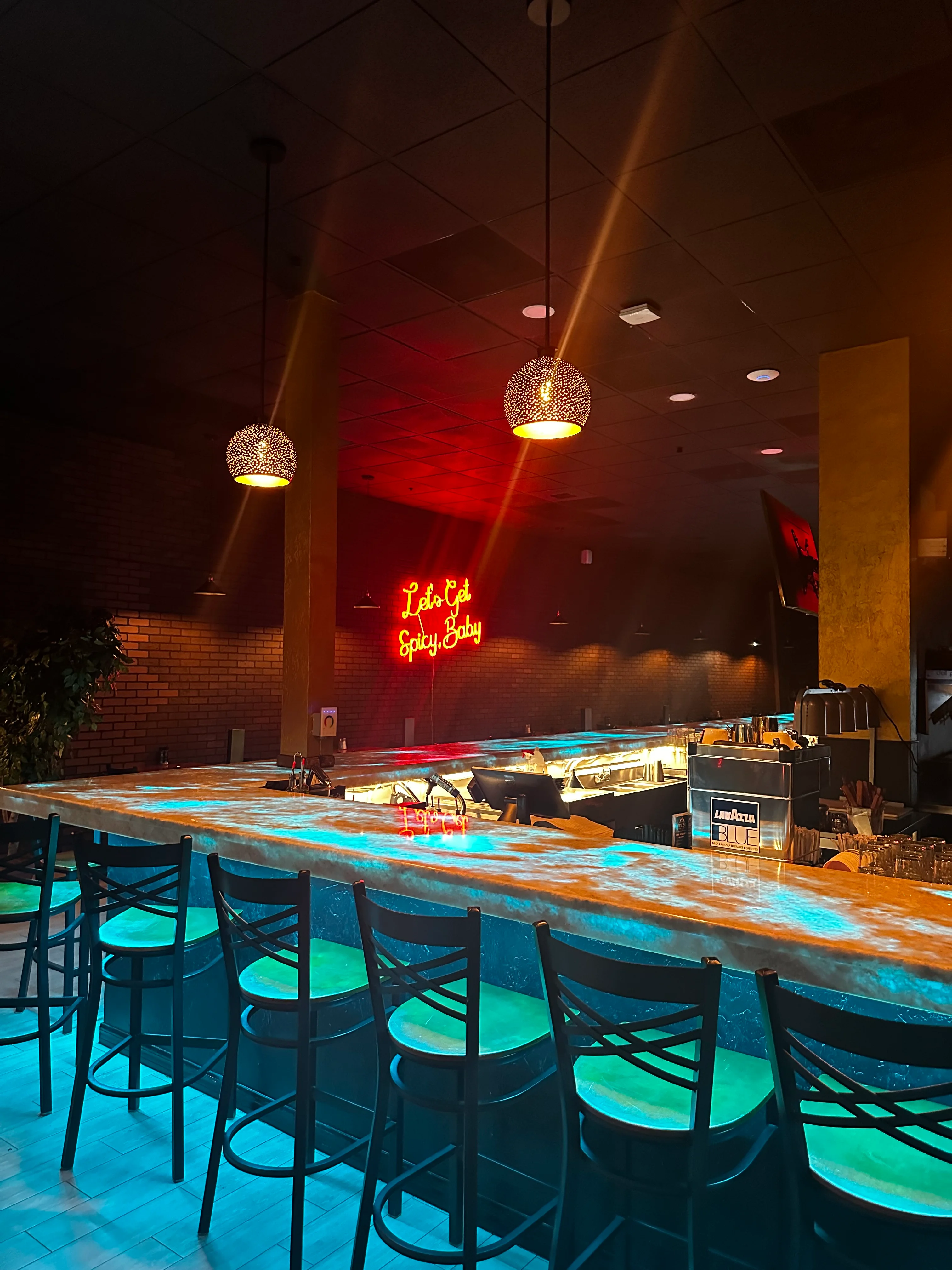 Stylish bar interior with neon lighting and modern decor