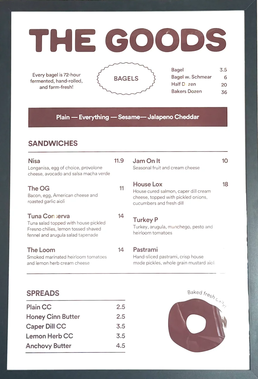Menu featuring bagels and sandwiches with prices and descriptions.
