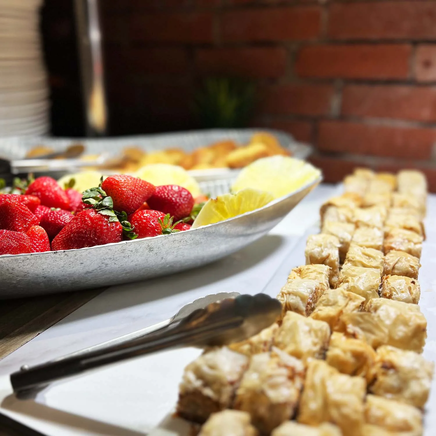 Platter of fresh strawberries and baklava dessert
