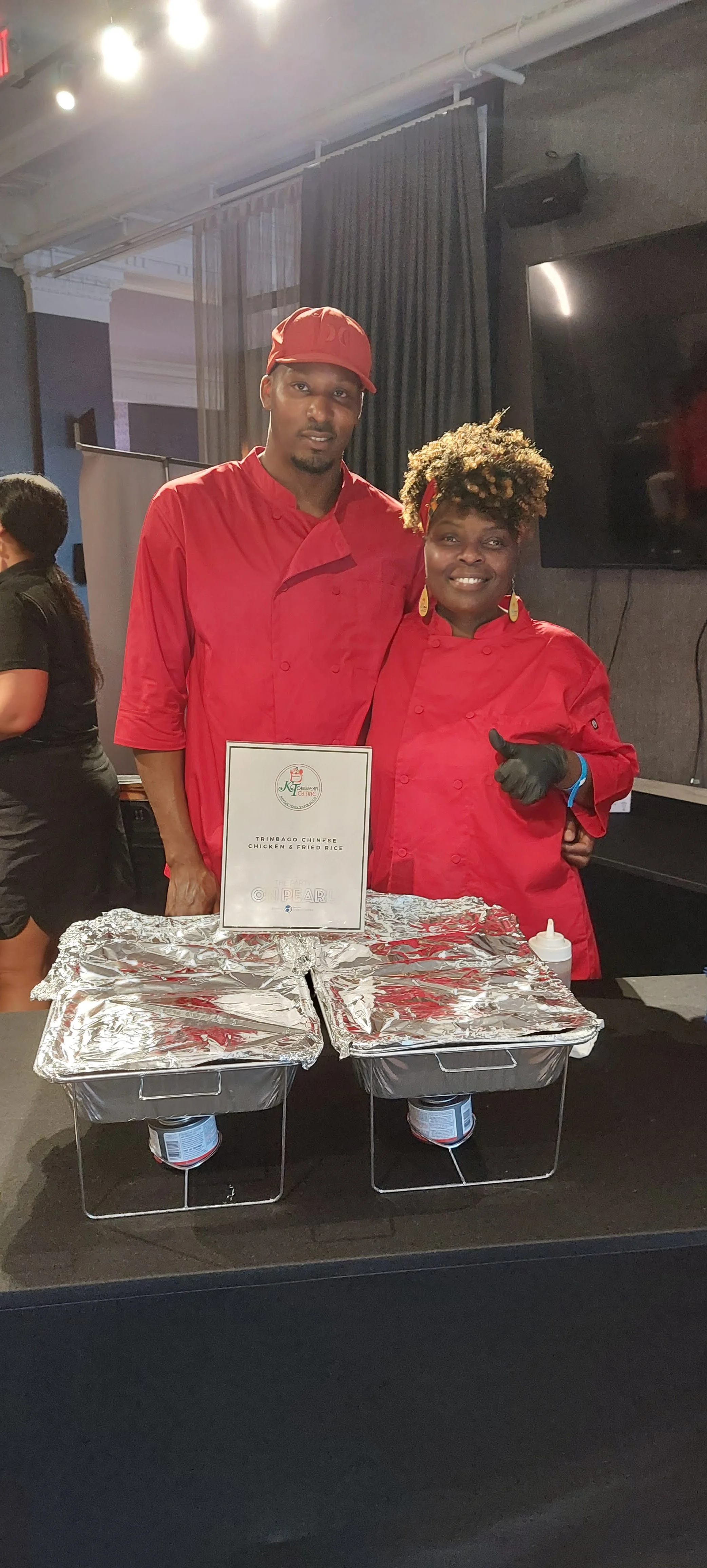 Trinidadian Chinese chicken and fried rice served at an event