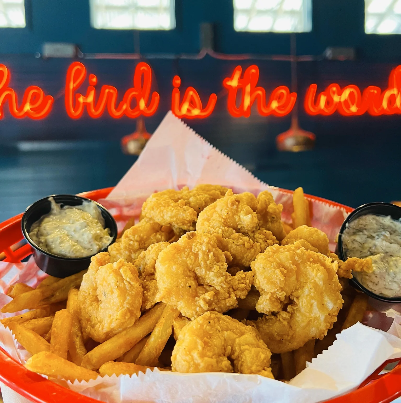 Crispy fried shrimp with fries and dipping sauce
